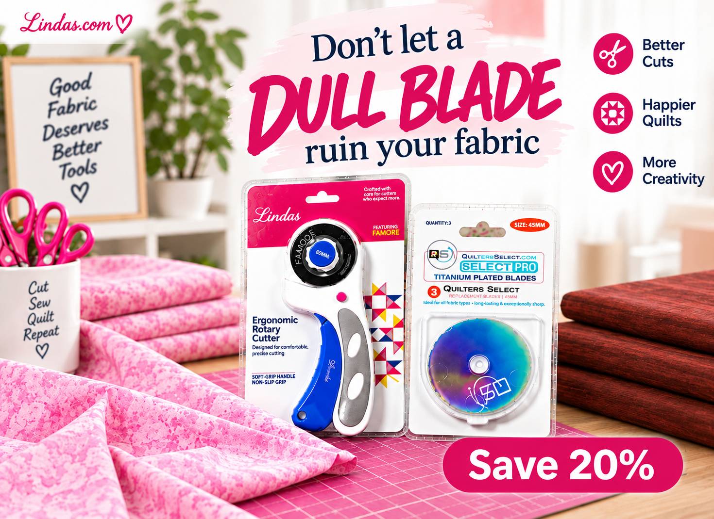 Linda's rotary cutters and replacement blade packs displayed on a pink patterned quilting fabric background