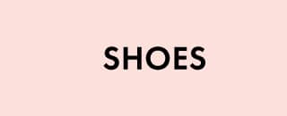 The word SHOES is displayed in large, black, sans-serif capital letters centered on a pale pink background.